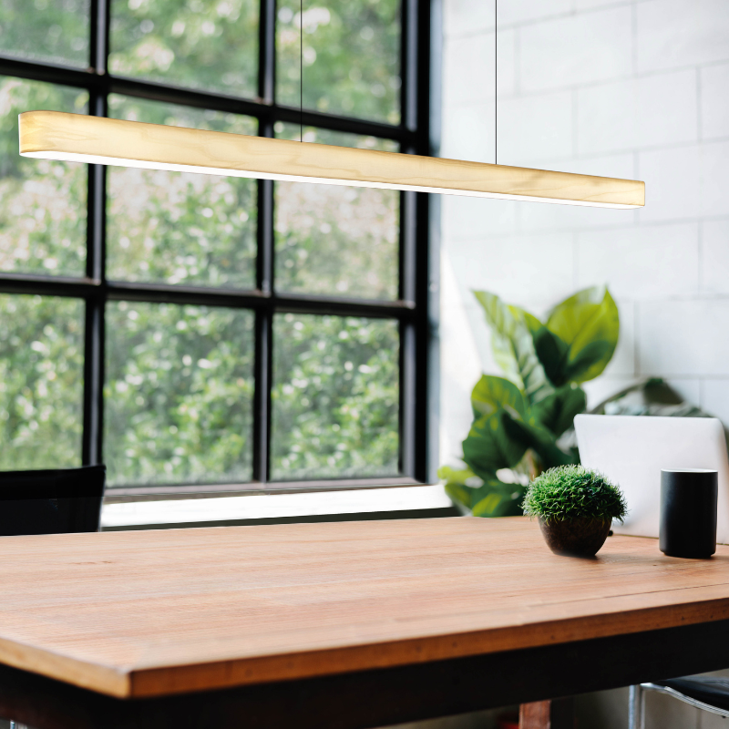 The Long I-Line Suspension from LZF lamps with the ivory white veneer in a home office.