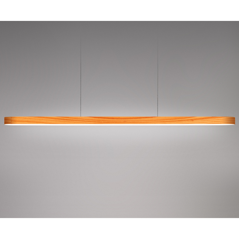The Long I-Line Suspension from LZF lamps with the natural beech veneer in a studio.