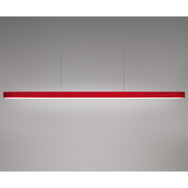 The Long I-Line Suspension from LZF lamps with the red veneer in a studio.