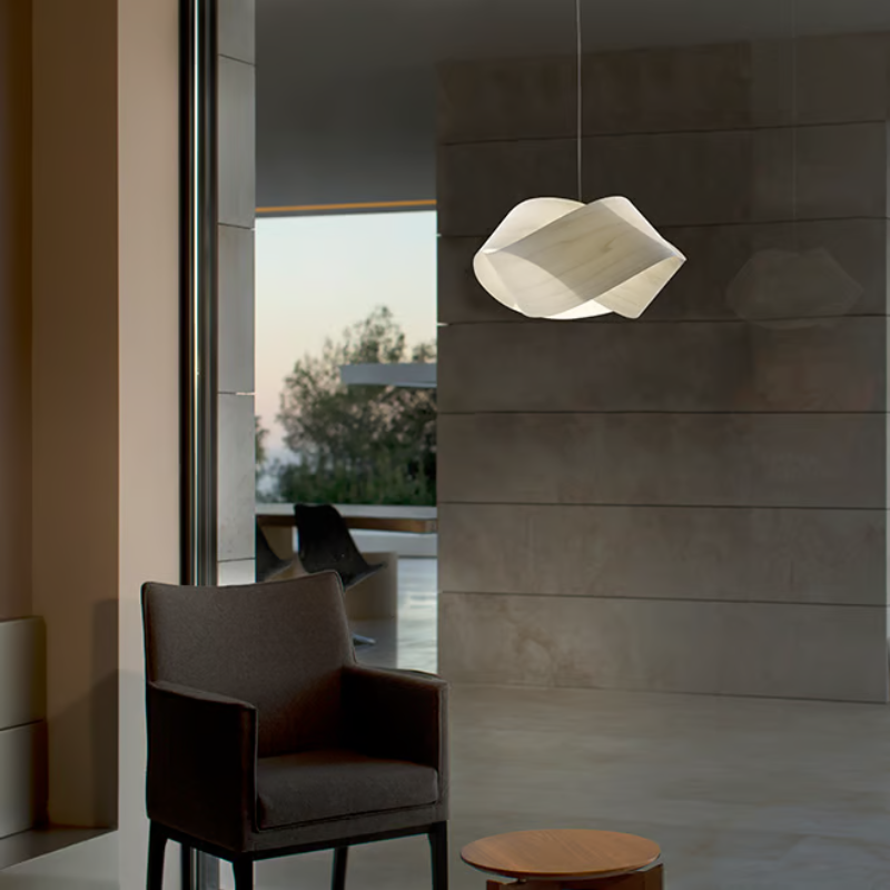The Nut Suspension from LZF Lamps in ivory white in a lounge.