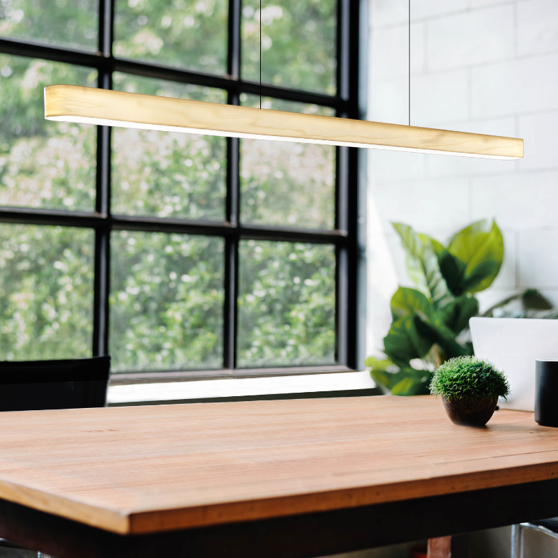 The Short I-Line Suspension from LZF lamps with ivory white veneer in a home office.