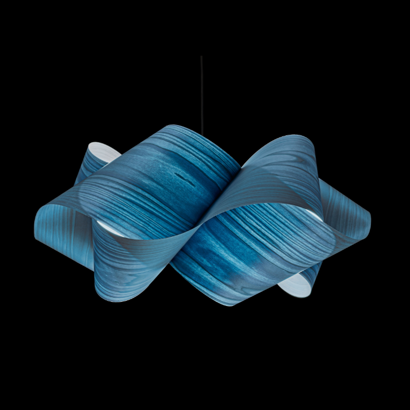 The Swirl Suspension from LZF Lamps in blue in a studio.