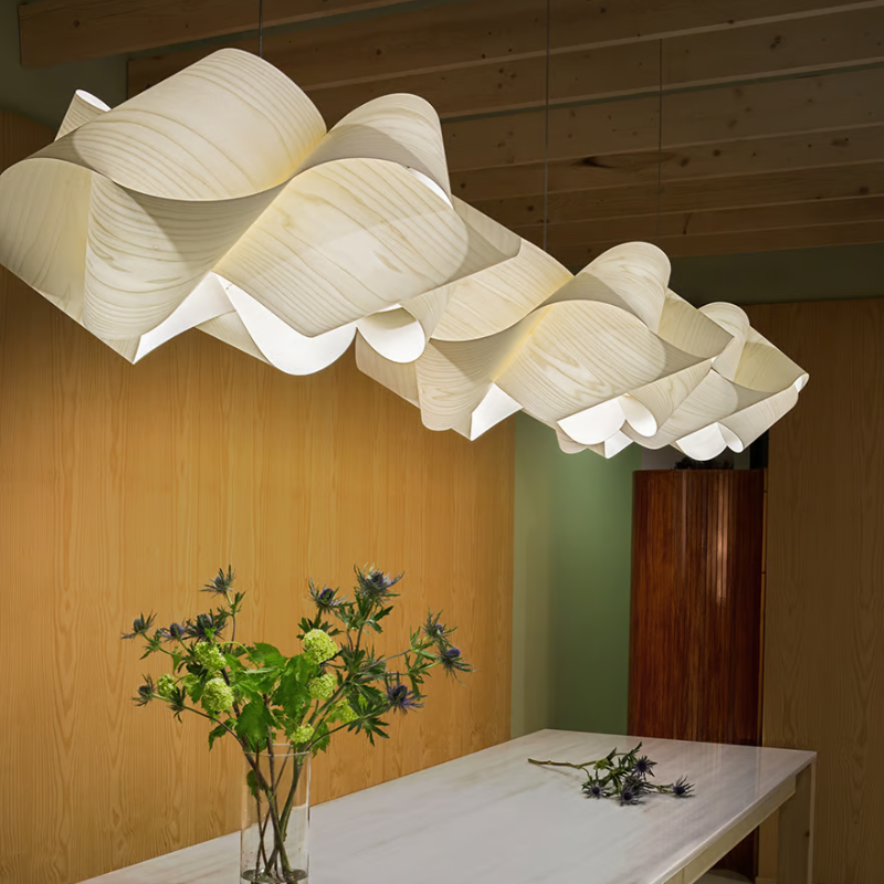The Swirl Suspension from LZF Lamps in ivory white in a walk in closet.