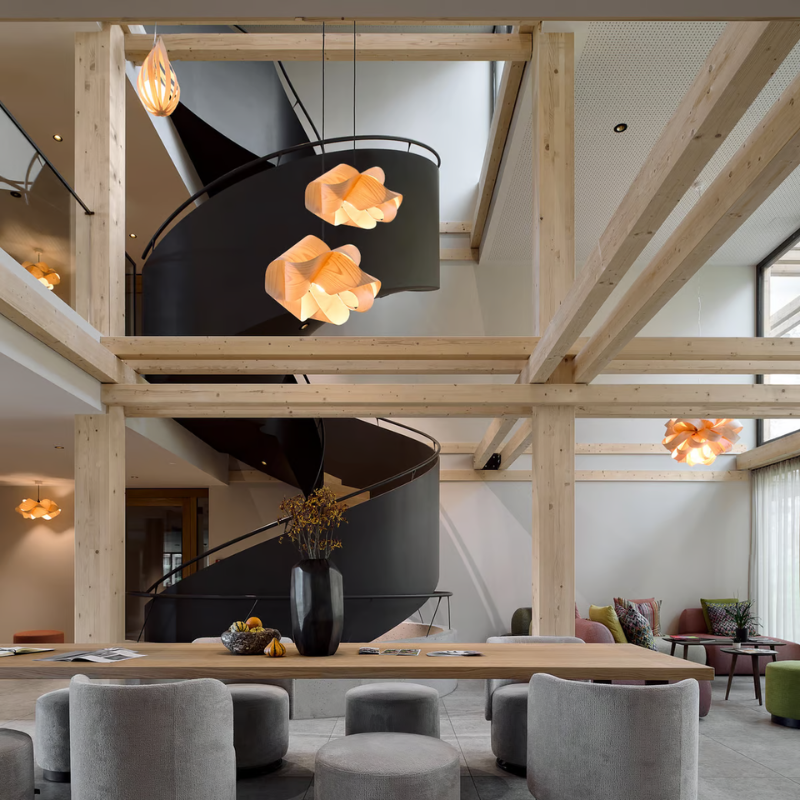 The Swirl Suspension from LZF Lamps in natural beech in a designer home.