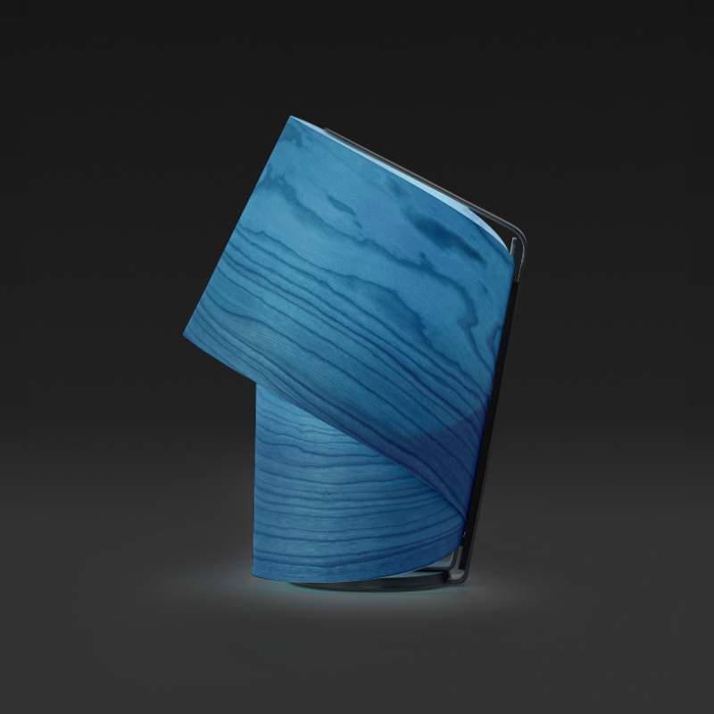 The Tiny Table from LZF lamps in blue in a studio.