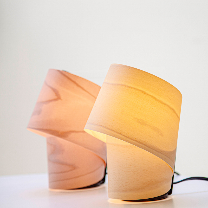 The Tiny Table from LZF lamps in ivory white showing two color options.