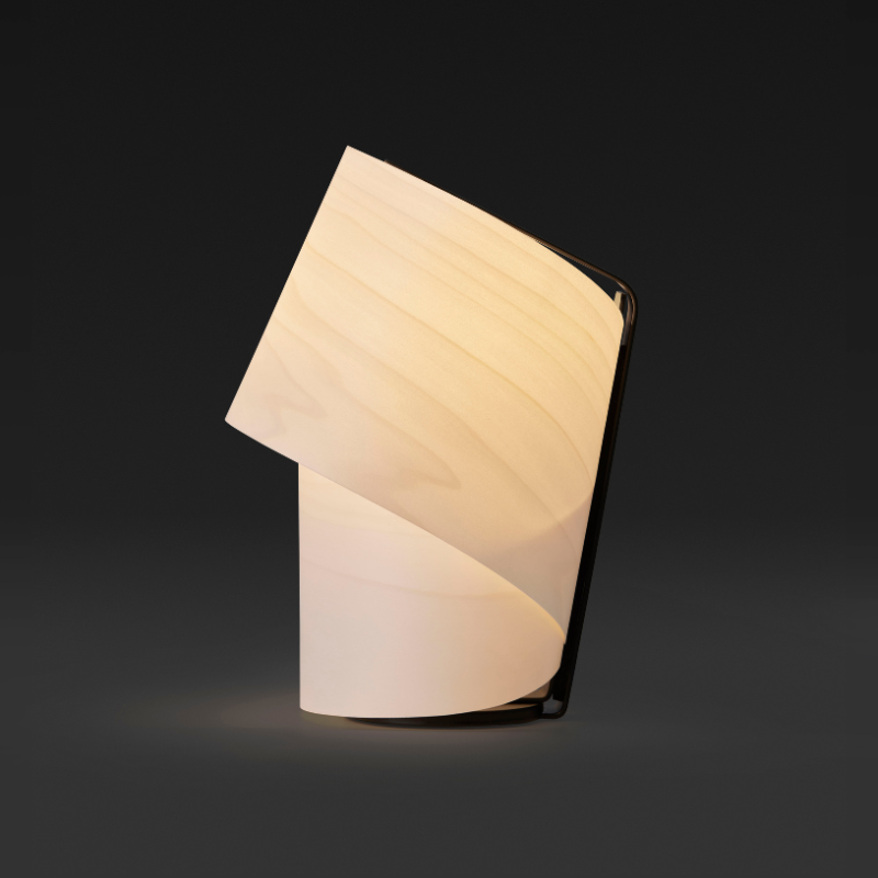 The Tiny Table from LZF lamps in ivory white in a studio.