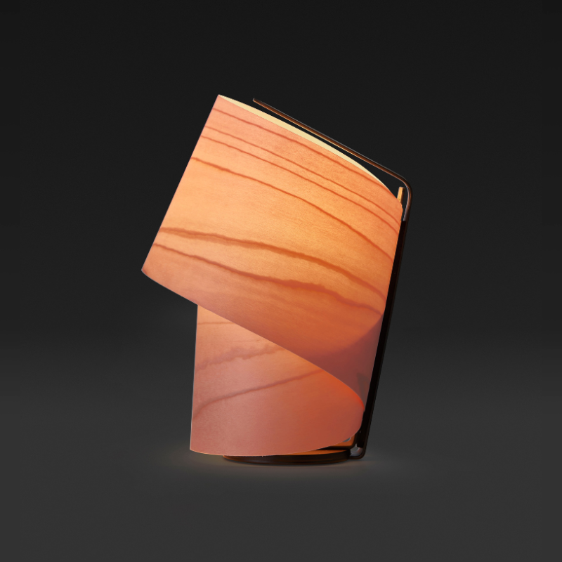 The Tiny Table from LZF lamps in pale rose in a studio.