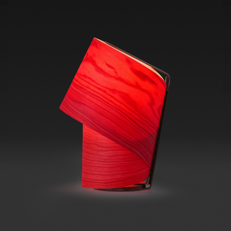 The Tiny Table from LZF lamps in red in a studio.