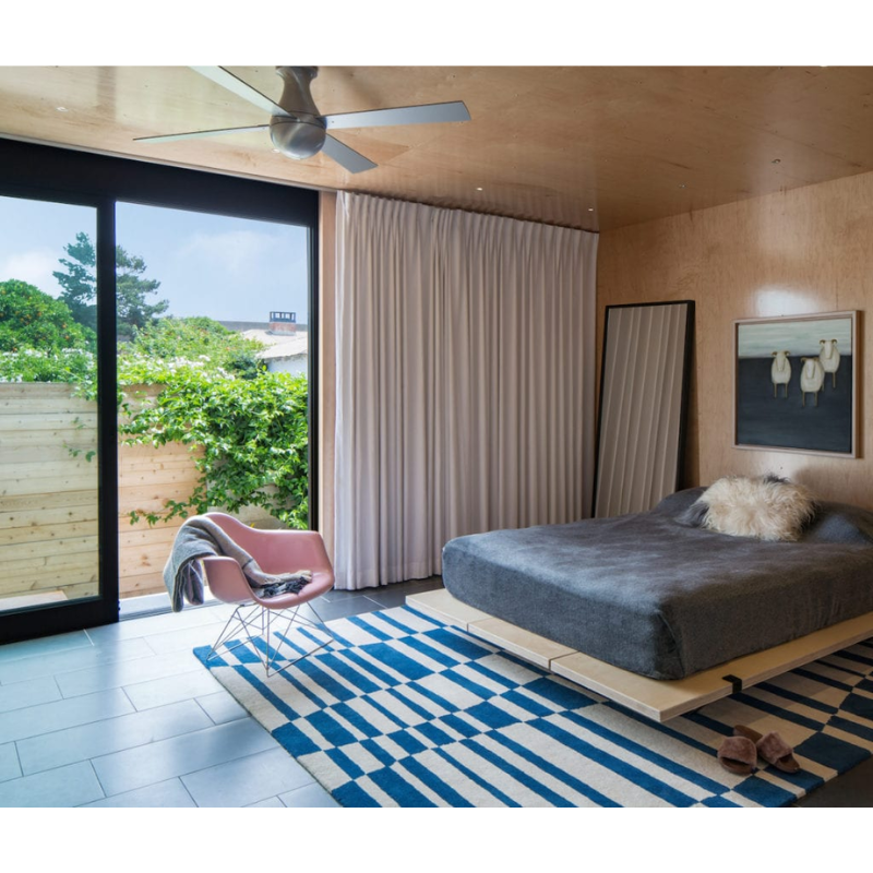 The Ball Flush ceiling fan from the Modern Fan Co. in a bedroom.