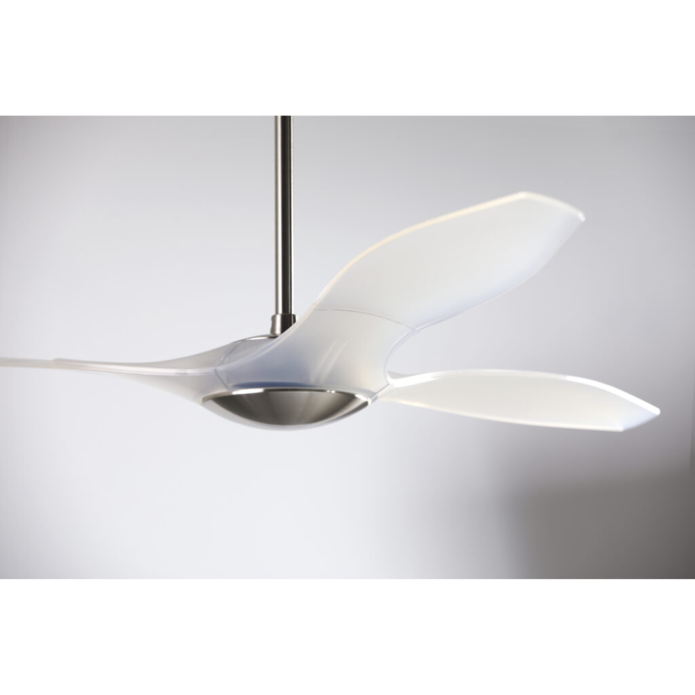 The bright nickel and translucent IC/Brisa DC - 56″ from Modern Fan Co. shown in detail within a living space.