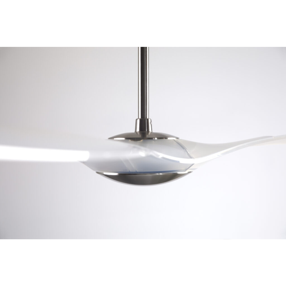 The bright nickel and translucent IC/Brisa DC - 56″ from Modern Fan Co. in a side view within a family space.