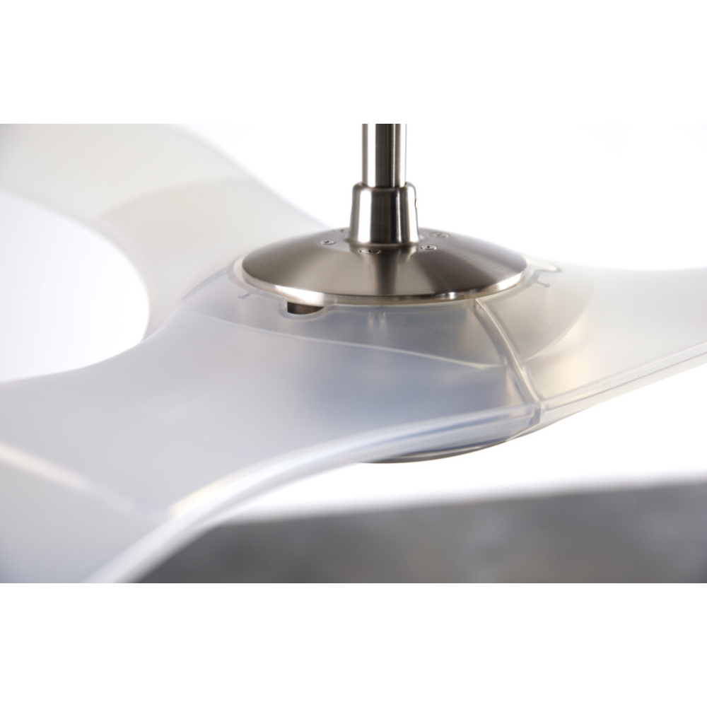 The bright nickel and translucent IC/Brisa DC - 56″ from Modern Fan Co. in a view from the top in a family area.