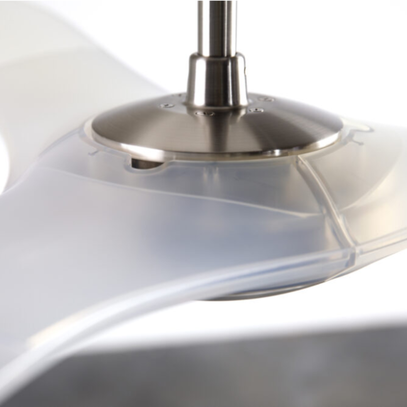 The bright nickel and translucent IC/Brisa DC - 56″ from Modern Fan Co. in a view from the top in a family area.