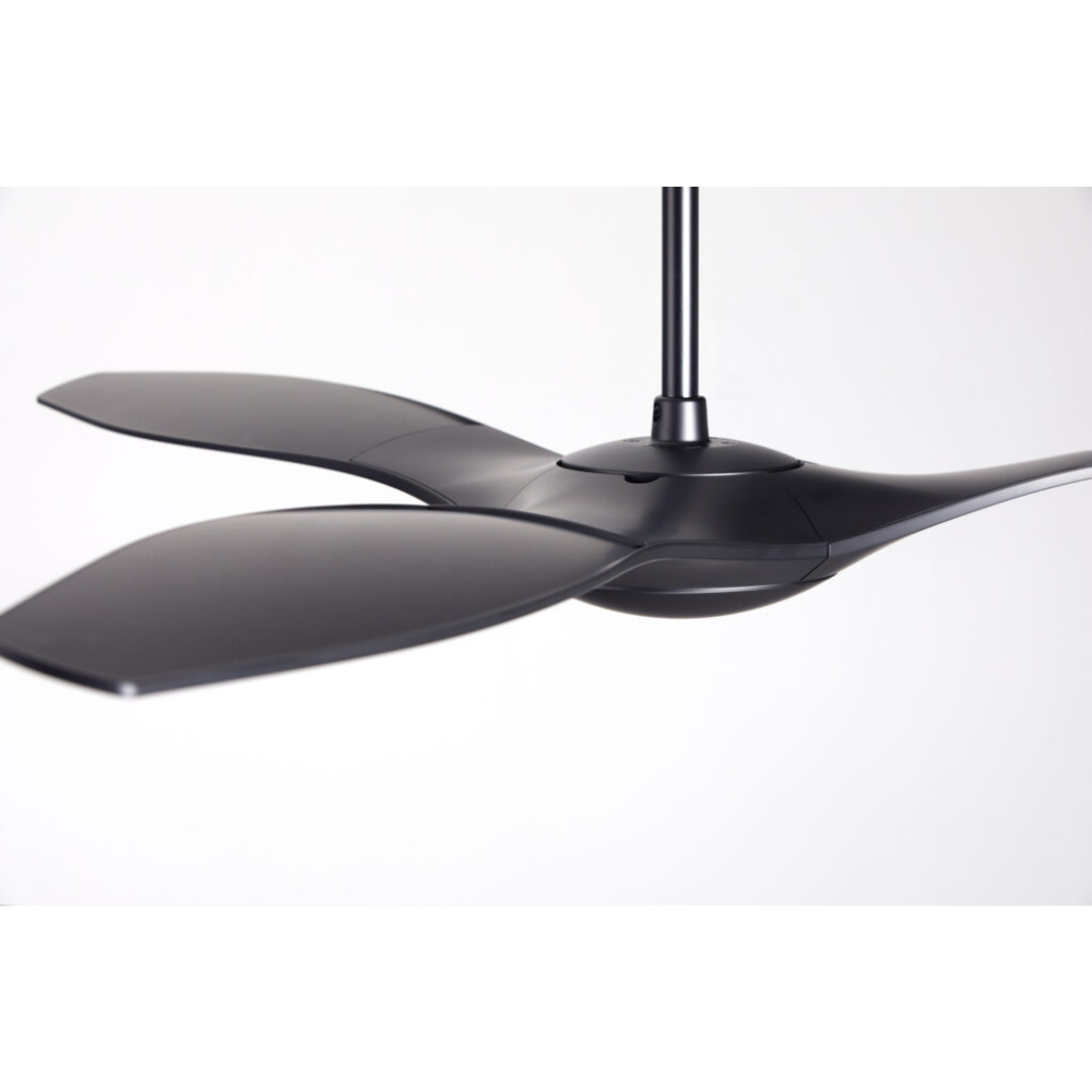 The matte black IC/Brisa DC - 56″ from Modern Fan Co. focusing on the blades within a living space.