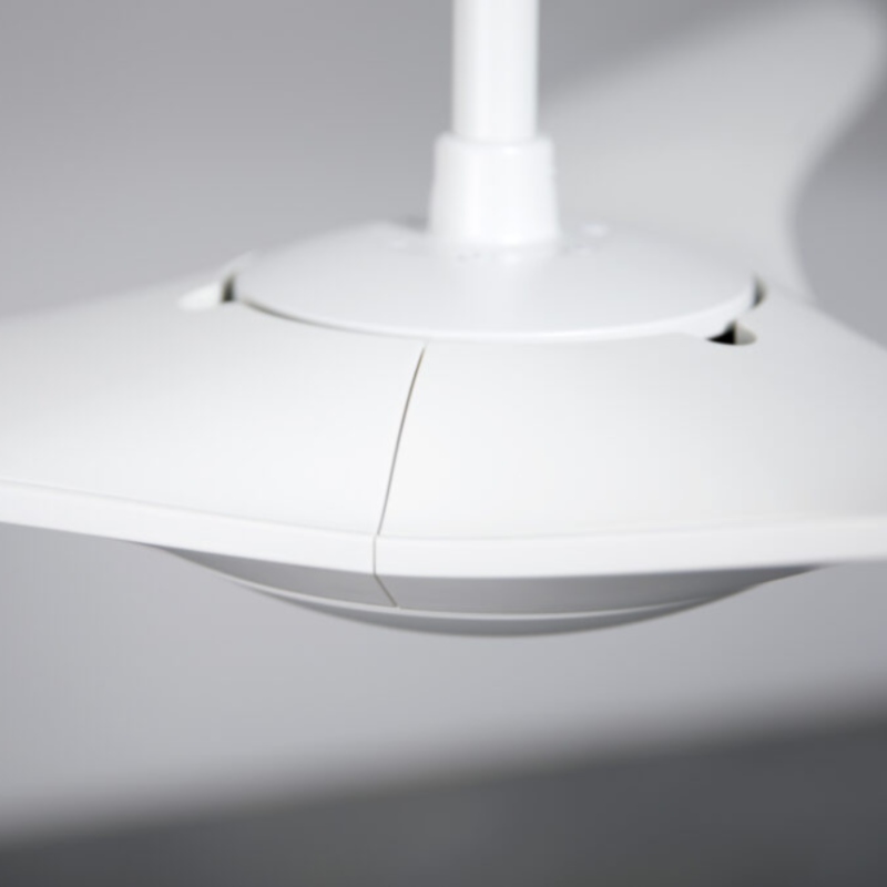 The matte white IC/Brisa DC - 56″ from Modern Fan Co. showing the top within a family area.