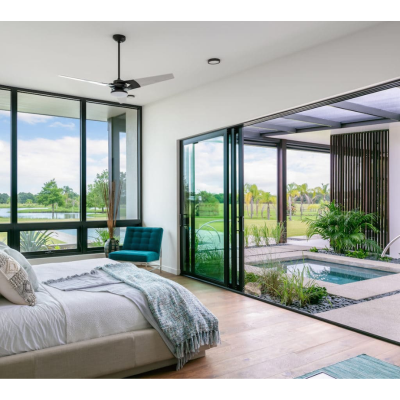 The Torsion 17W LED - 62" by Modern Fan Co. in a bedroom.