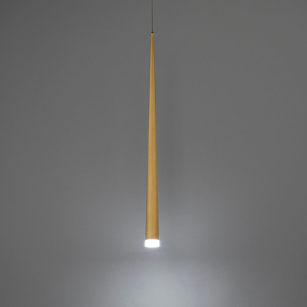 The aged brass Cascade Pendant Light from Modern Forms in a living room.