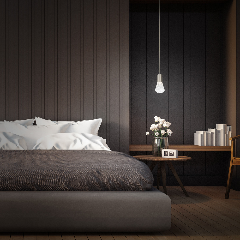 The satin nickel Plum Pendant Light from Modern Forms in a primary bedroom.