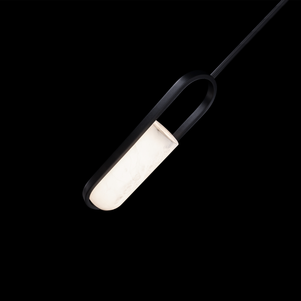 The black Rollins Pendant Light from Modern Forms in a lounge.