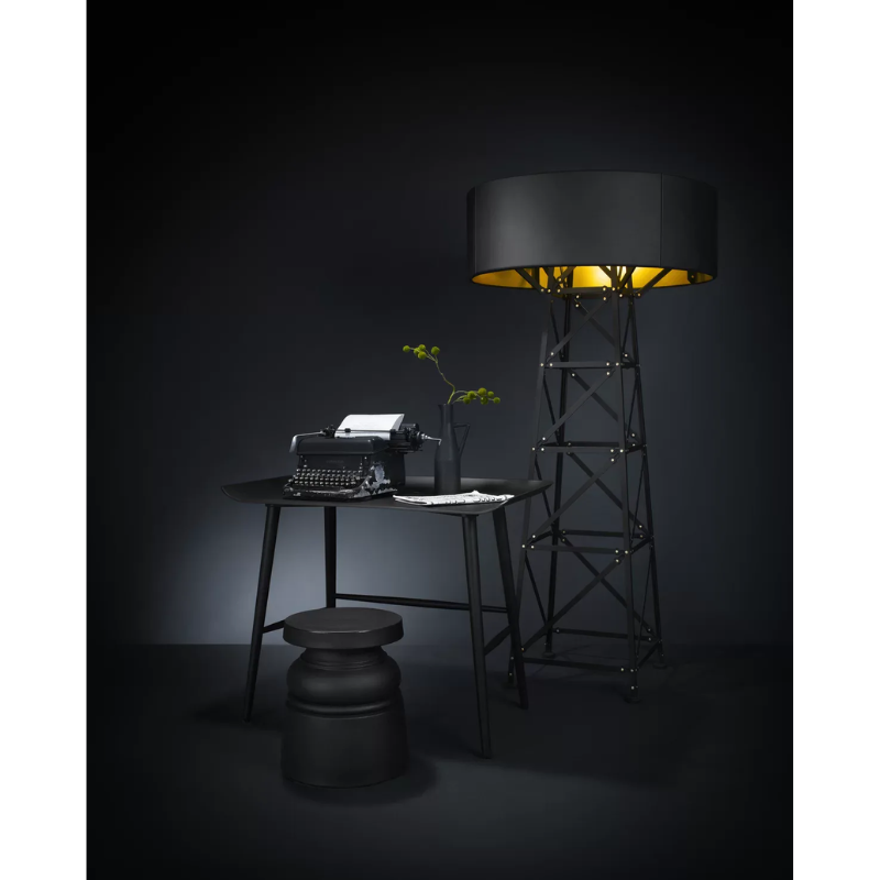 The Construction Lamp Floor from Moooi in black within a home office.