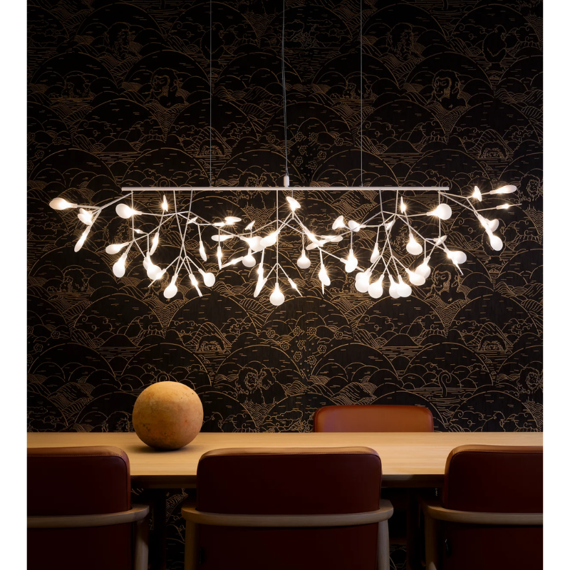 The white Heracleum III Linear from Moooi in a dining space.