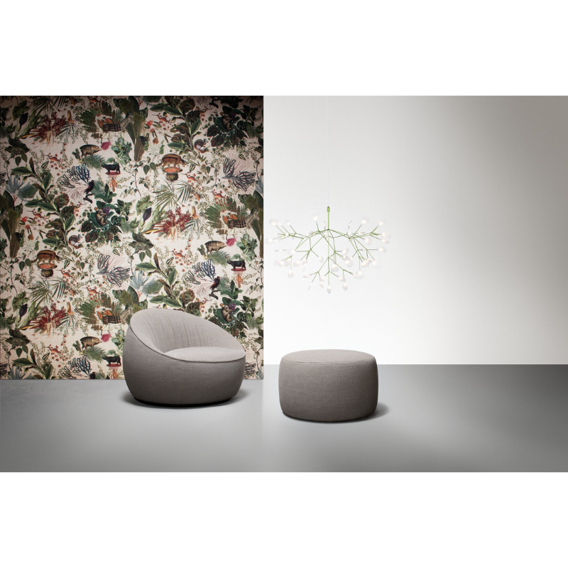 The green Heracleum III Suspended from Moooi in a living room.