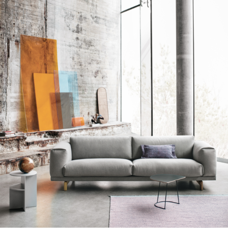 The Airy Coffee Table from Muuto in black in a family area.