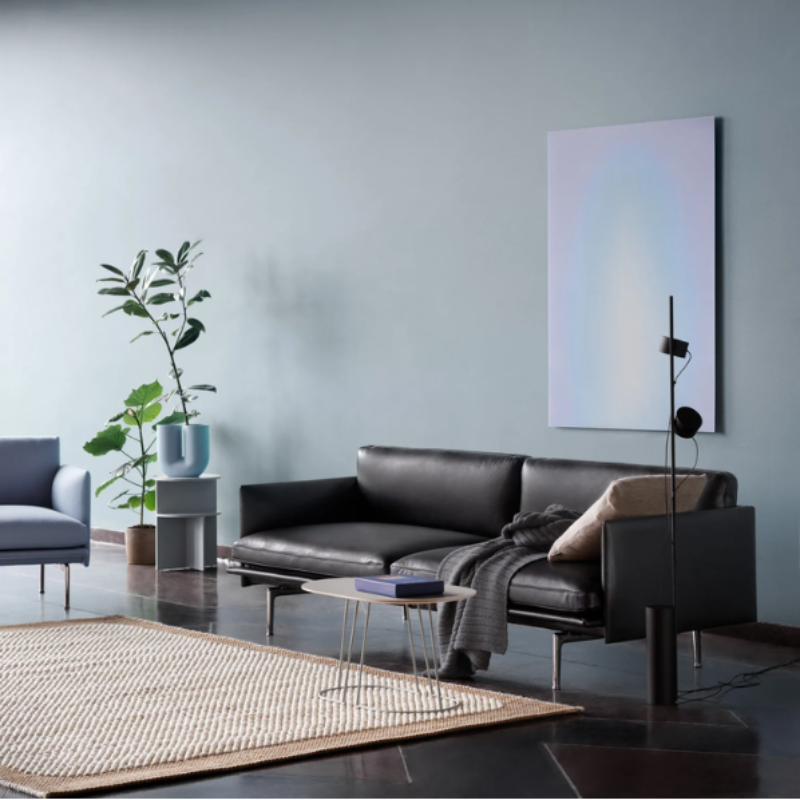 The Airy Coffee Table from Muuto in gray in a family space.