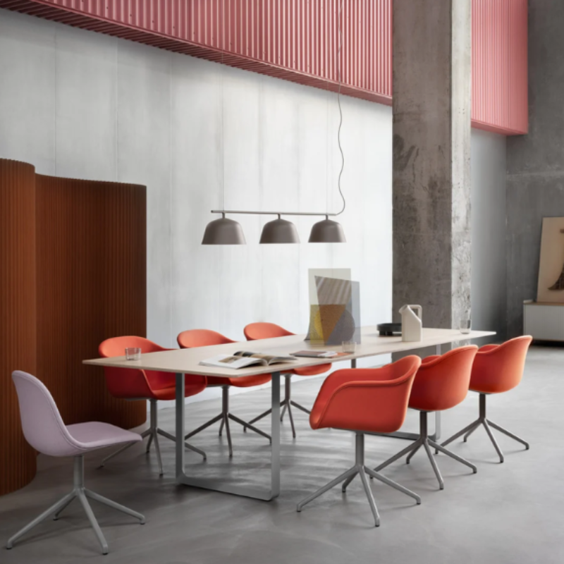 The taupe Ambit Rail Lamp from Muuto in a business lobby.