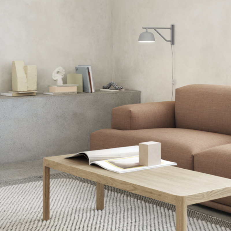 The gray Ambit Wall Lamp from Muuto in a family space.