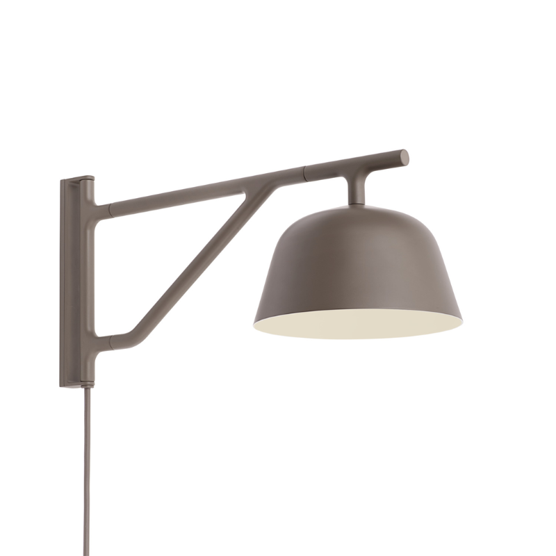 The Ambit Wall Lamp from Muuto in taupe from an angle.