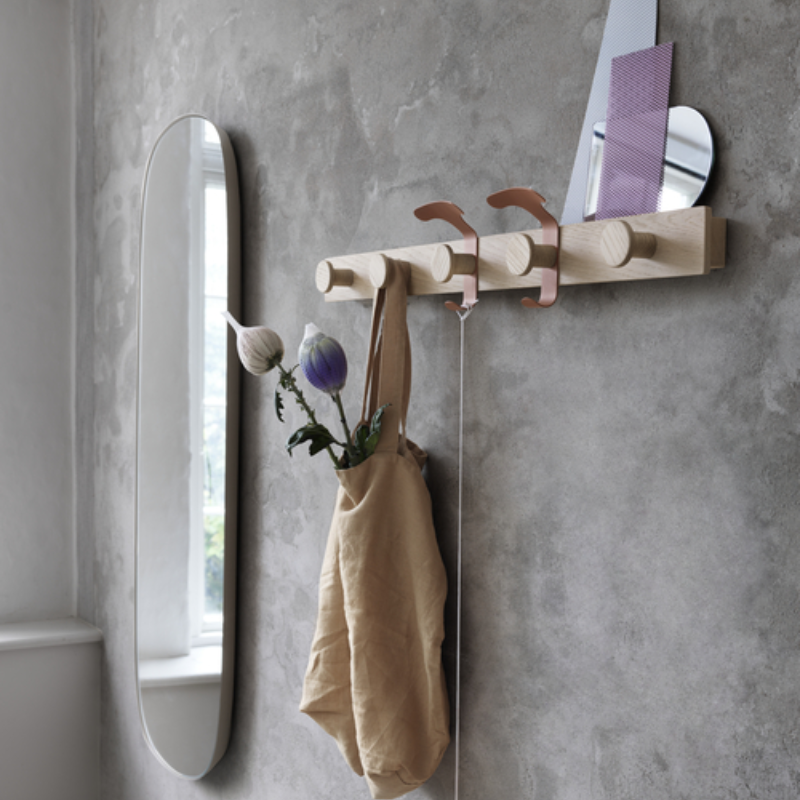 The Avail Coat Rack Oak/Copper Brown from Muuto in a bathroom. all-groups