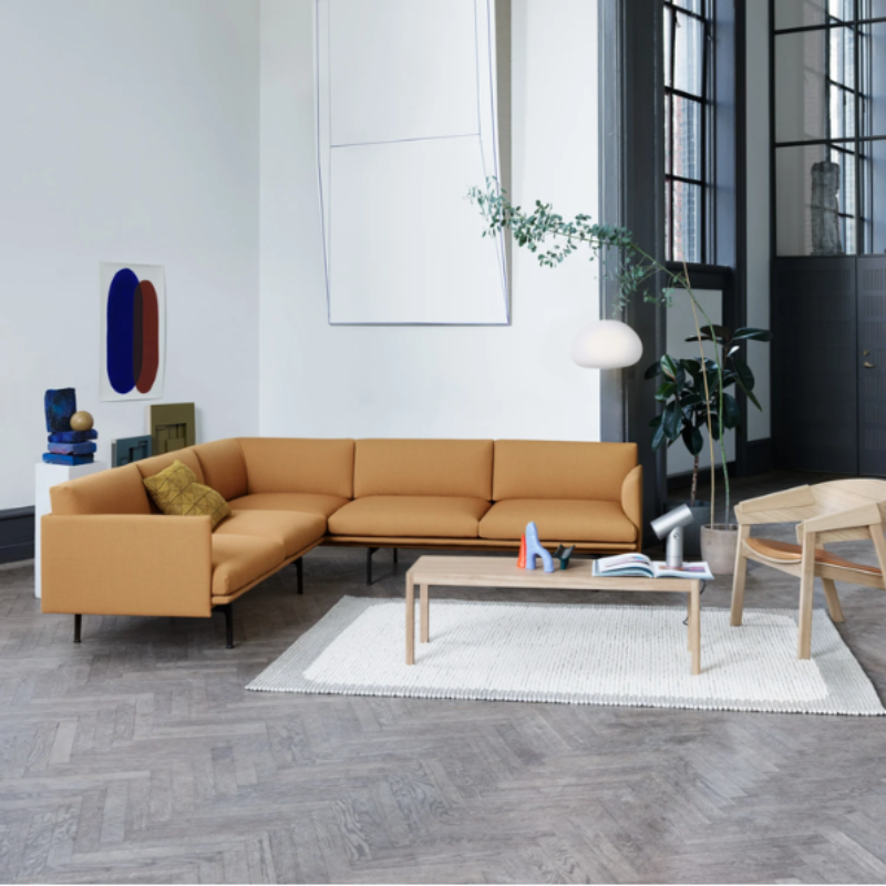 The aluminum Beam Table Lamp from Muuto in a lounge.