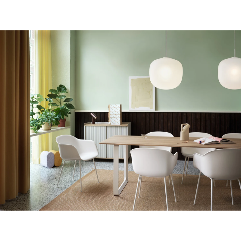 The umber Beam Table Lamp from Muuto in a dining room.