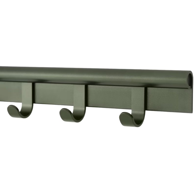 The Coil Coat Rack Large Dark Green from Muuto with a close-up.