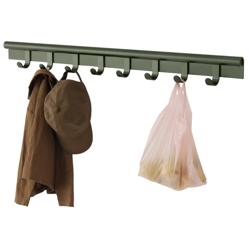 The Coil Coat Rack Large Dark Green from Muuto with the hanging items.