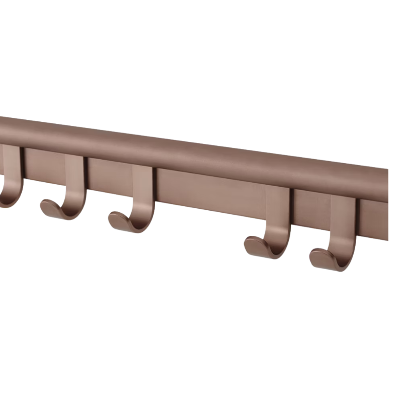 The Coil Coat Rack Large Plum from Muuto with a close-up.