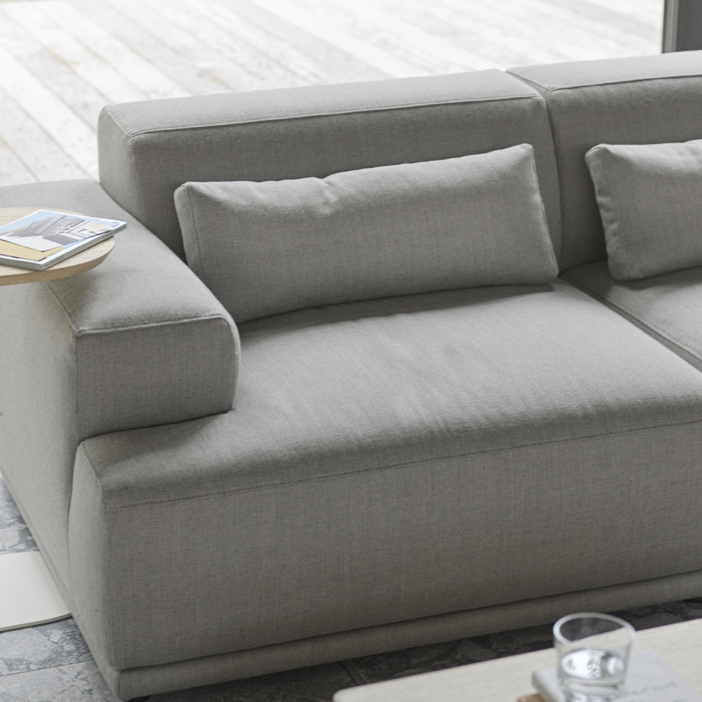 The Connect Soft Modular Sofa Corner from Muuto with Clay 12 fabric upholstery within a lounge.