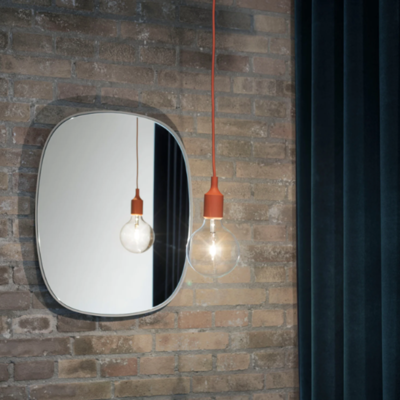 The clay brown E27 Pendant Lamp from Muuto in a living area.