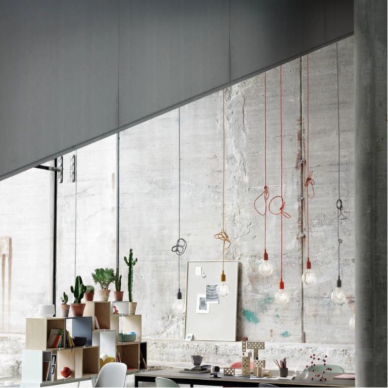 The E27 Pendant Lamp from Muuto in an office shwoinng various color options. all-groups