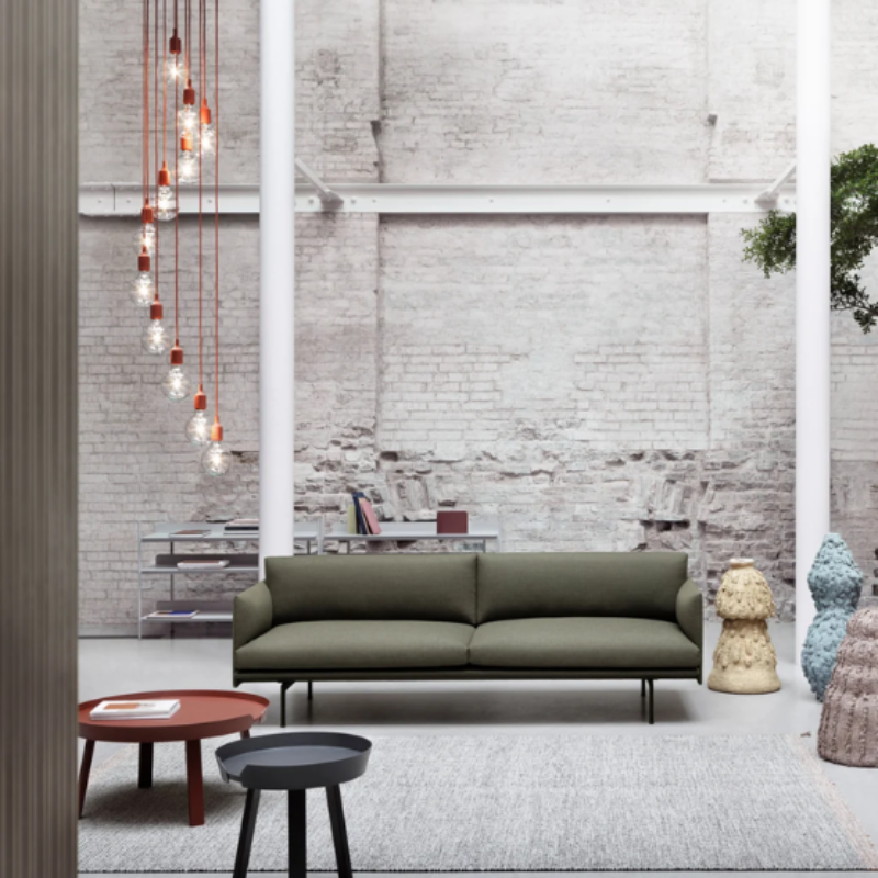 The E27 Pendant Lamp from Muuto in multiple color shades within a living room. all-groups