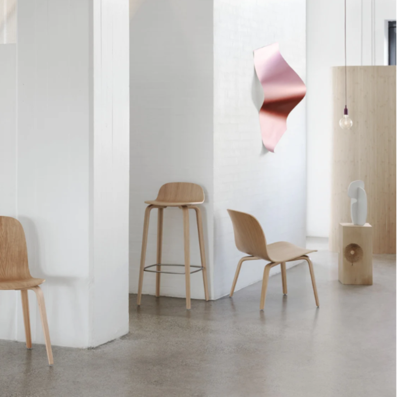 The dusty lilac E27 Pendant Lamp from Muuto in a family area.