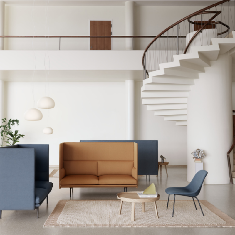 Two large Fluid Pendant Lamps from Muuto in a lounge.