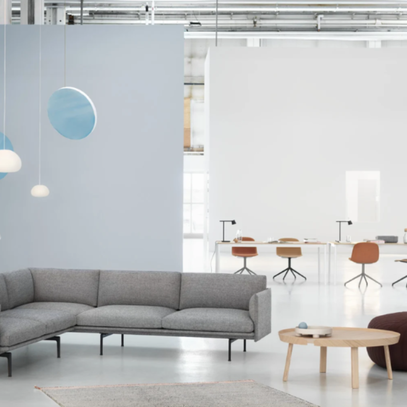 The large Fluid Pendant Lamp from Muuto in a workplace.