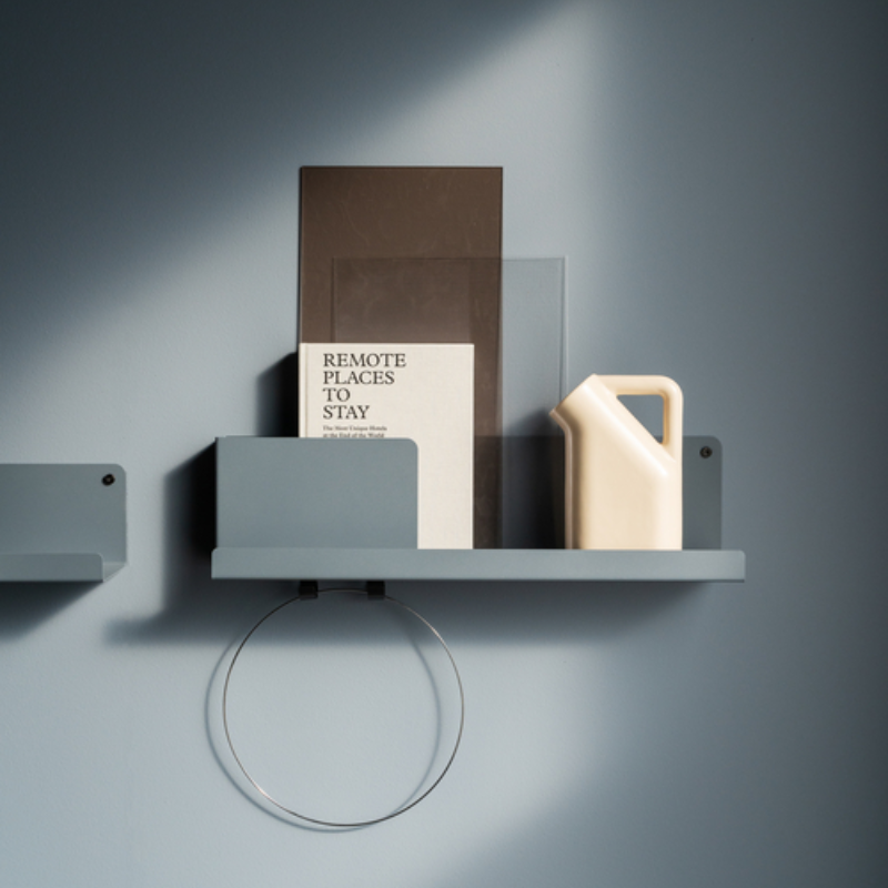 The 11 inch Folded Shelves from Muuto in Blue Grey in a living area.