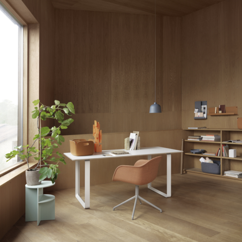 The Burnt Orange Folded Shelves from Muuto in a meeting space.