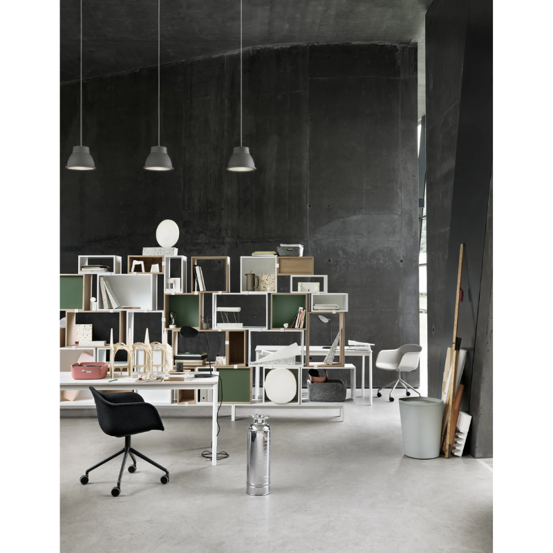 The gray Grain Pendant Lamp from Muuto in a business space.