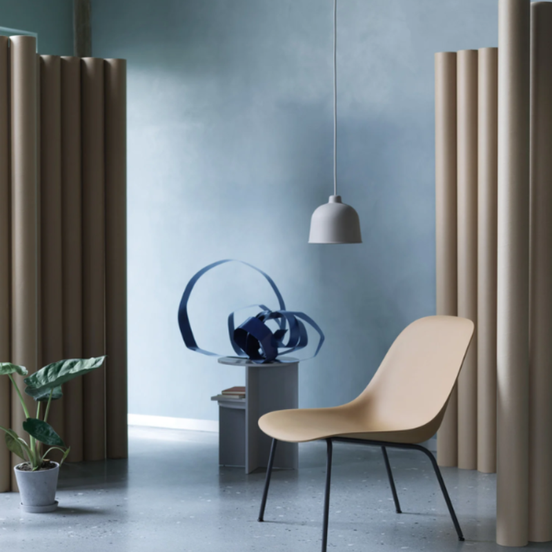 The gray Grain Pendant Lamp from Muuto in a living area.