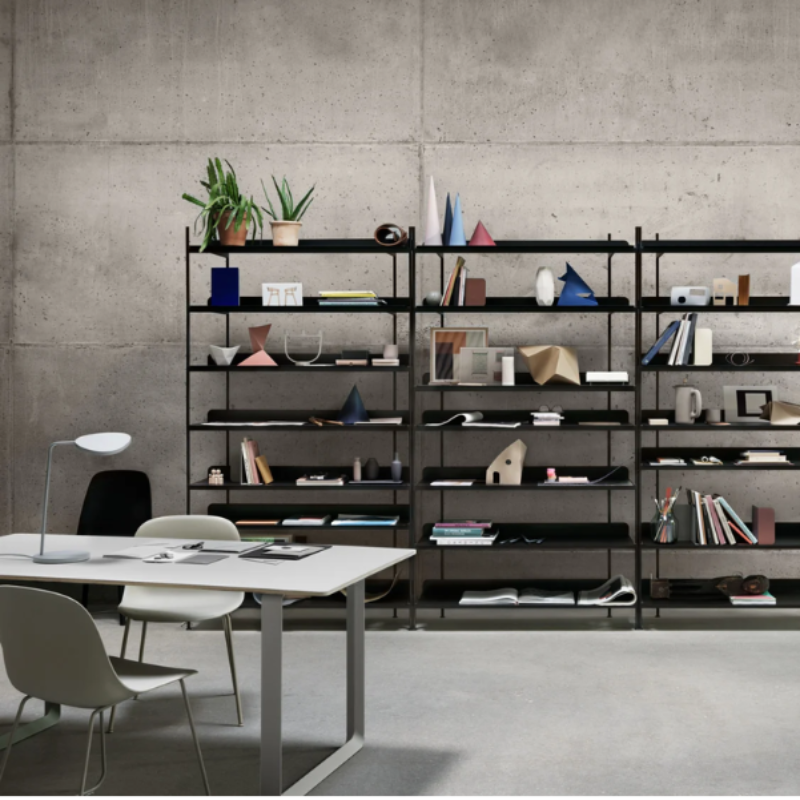 The white Leaf Table Lamp from Muuto in a business office.